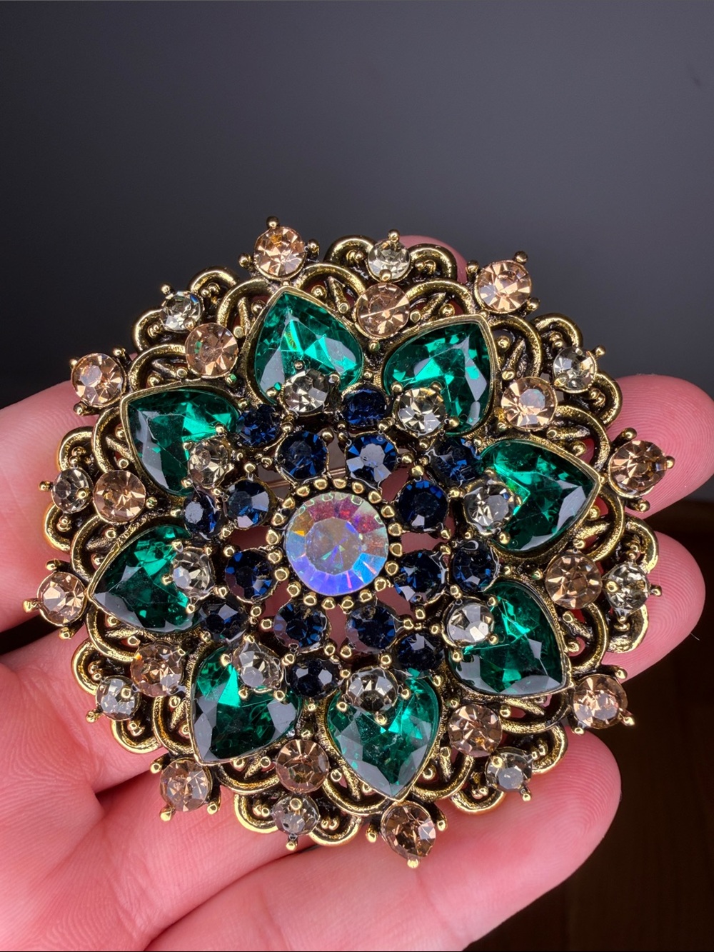 Vintage-Inspired Gold Brooch with Emerald Green and Sapphire Crystals